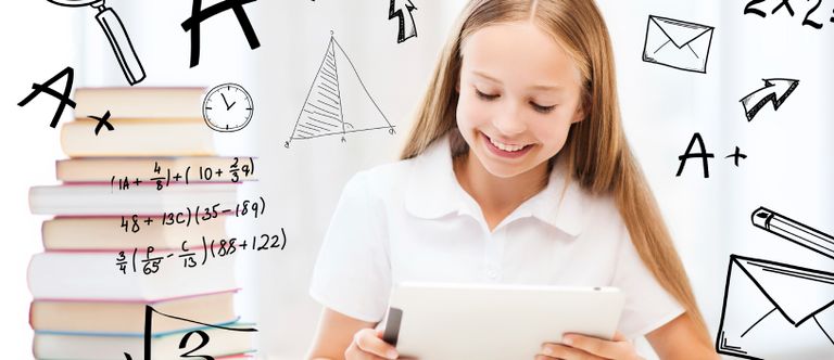 School girl reading from e-learning device.